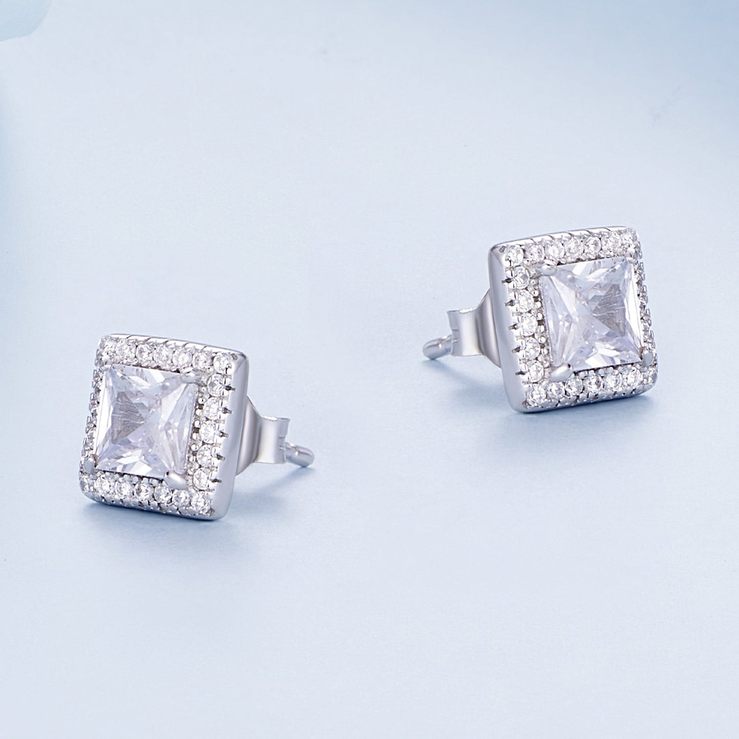925 Sterling Silver Earrings with Pavé Setting CZ and Platinum Plating.