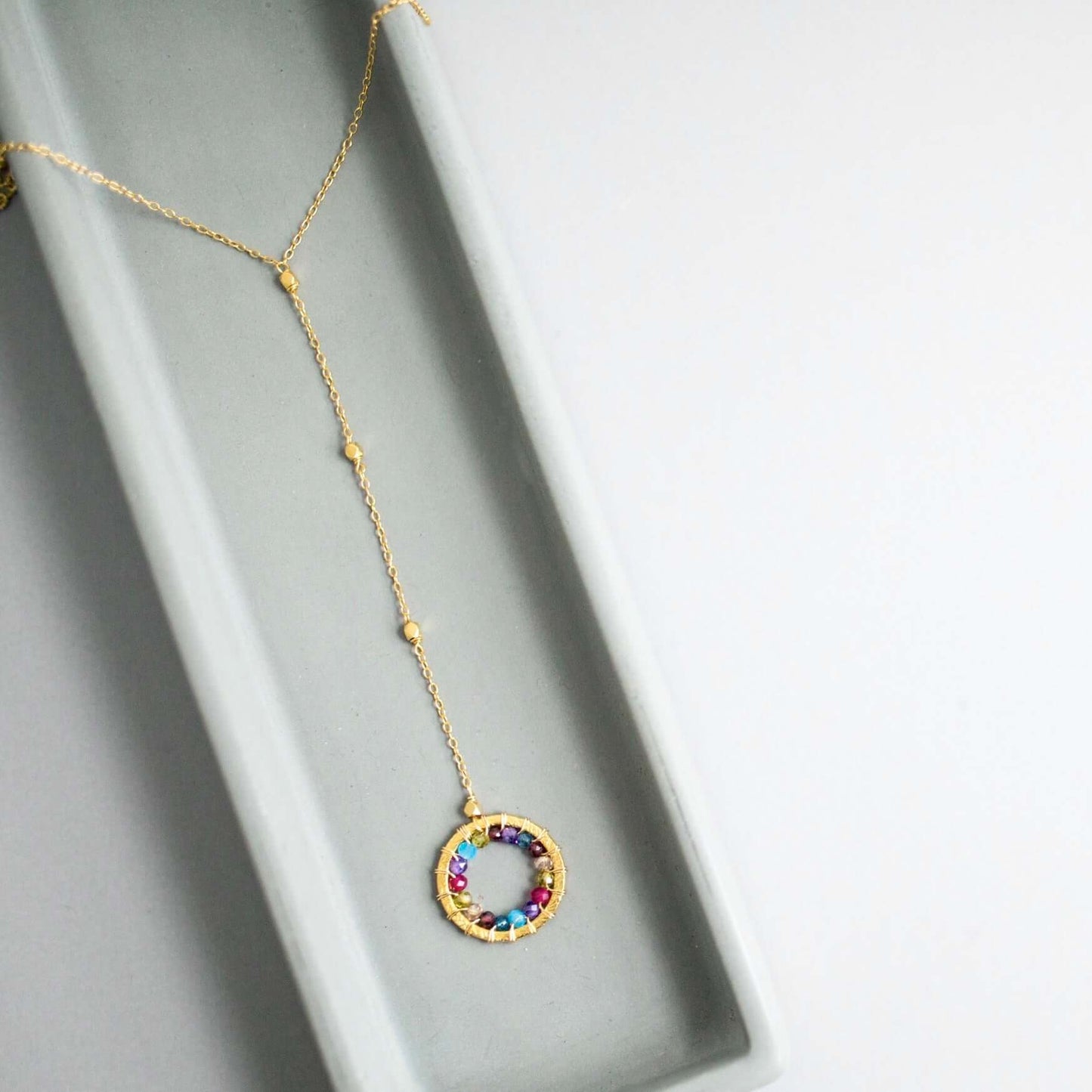 Black Spinel, Rainbow Gemstone and Pearl Halo Y Pendants